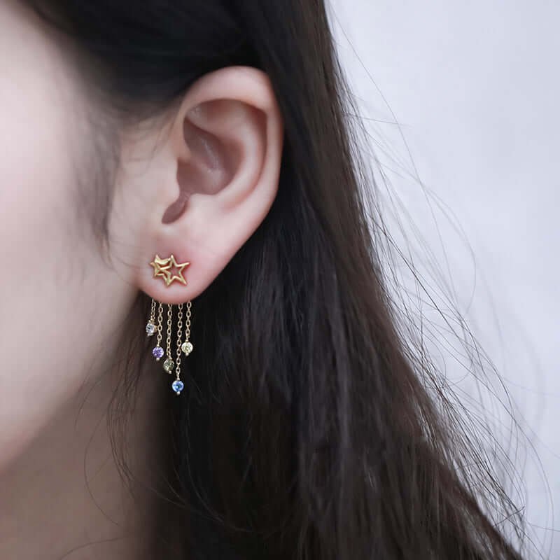 Image 1: Boucles d'oreilles à glands en cristal naturel bijoux élégants vue complète Image 2: Gros plan cristaux naturels boucles d'oreilles glands élégantes femme Image 3: Femme portant boucles d'oreilles glands cristal naturel style élégant Image 4: Détail glands cristal naturel boucles d'oreilles bijoux raffinés Image 5: Boucles d'oreilles cristal naturel glands reflets lumineux élégants Image 6: Paire boucles d'oreilles glands cristal naturel bijoux premium femme